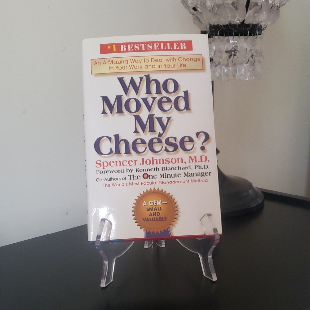 Book: Who Moved My Cheese? An A-Mazing Way to Deal with Change............